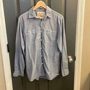 Cool, denim-colored casual men’s button down shirt.